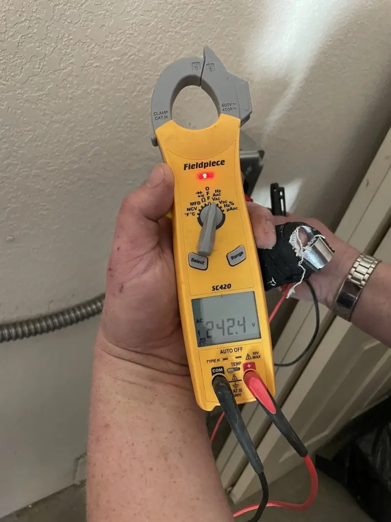 Voltage testing with clamp meter during Hot Tub / Pool Electrical Wiring in Highland